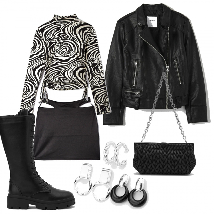 Outfit donna - In giro a pancia di fuori. Stile Rock per Tutti i giorni. Abbinamento con gonne, t-shirt, cappotti, anfibi, pochette, orecchini.