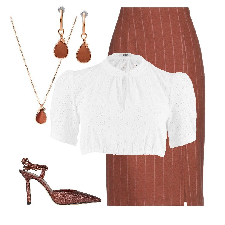 Outfit donna - Una camicia bianca molto particolare. Stile Bon Ton per Ufficio. Abbinamento con camicie, gonne longuette, décolleté, ciondoli, orecchini.