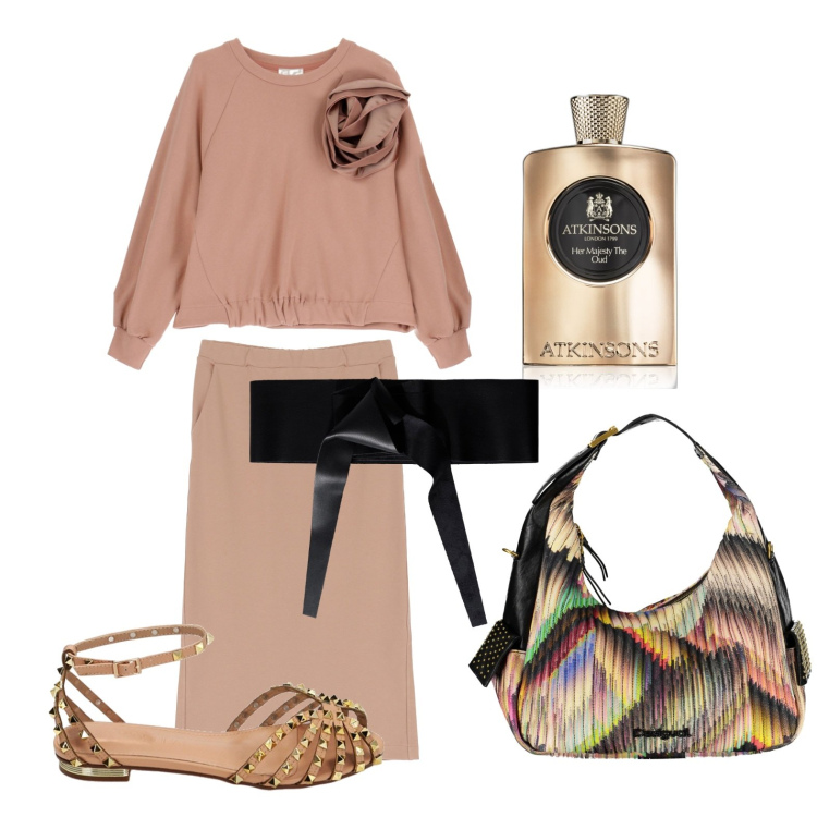 Outfit donna - La blusa col maxi fiore. Stile Casual chic per Tutti i giorni. Abbinamento con profumi, cinture, ballerine, felpe, gonne longuette, borse a spalla.