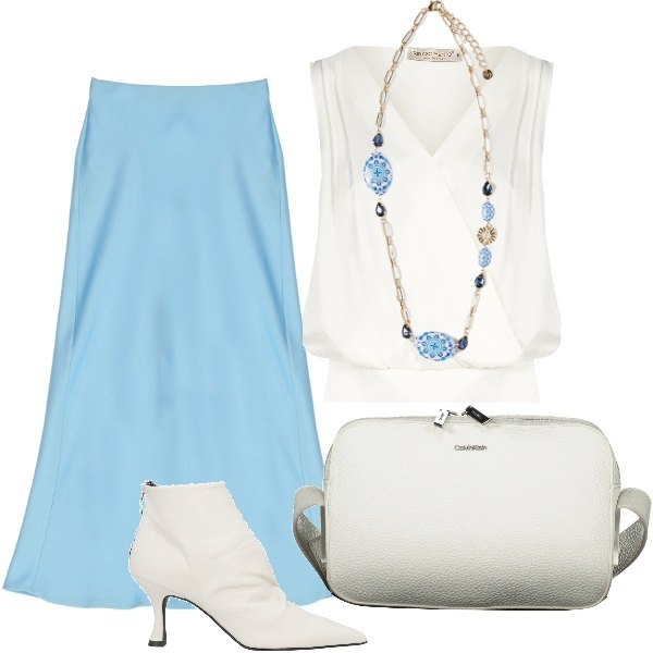 Outfit donna - aria. Stile Casual chic per Tutti i giorni. Abbinamento con stivaletti, top, gonne longuette, ciondoli, borse a tracolla.