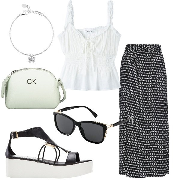 Outfit donna - Gonna lunga. Stile Casual per Tutti i giorni. Abbinamento con gonne lunghe, occhiali da sole, sandali col tacco, top, braccialetti con ciondoli, borse a tracolla.