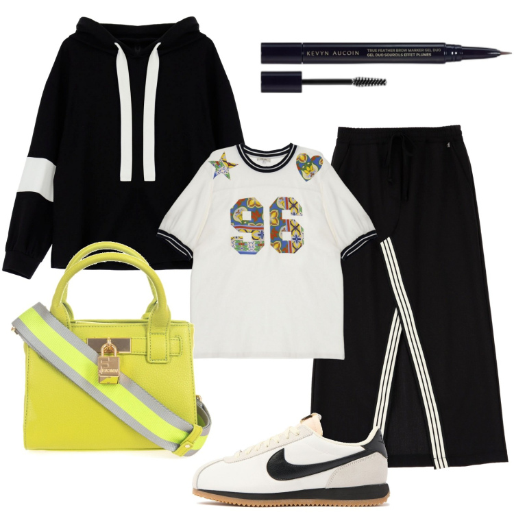 Outfit donna - La borsa fluo. Stile Sporty chic per Tutti i giorni. Abbinamento con eyeliner, felpe, gonne lunghe, t-shirt, borse a tracolla, sneakers.
