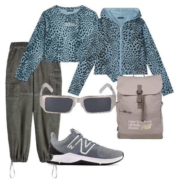 Outfit donna - A spasso per la città. Stile Sporty chic per Tutti i giorni. Abbinamento con sneakers, zaini, felpe con cappuccio, pantaloni cargo, felpe, occhiali da sole.