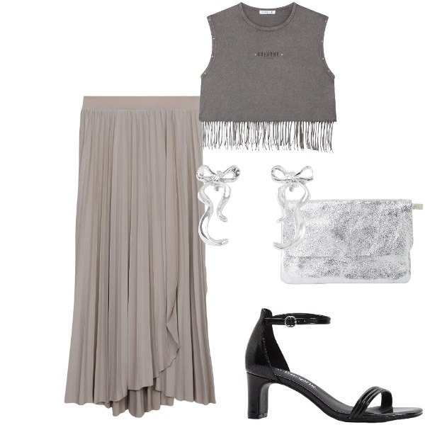 Outfit donna - Top sfrangiato e smanicato. Stile Urban per Serata fuori. Abbinamento con sandali col tacco, gonne lunghe, orecchini, top, borse a tracolla.