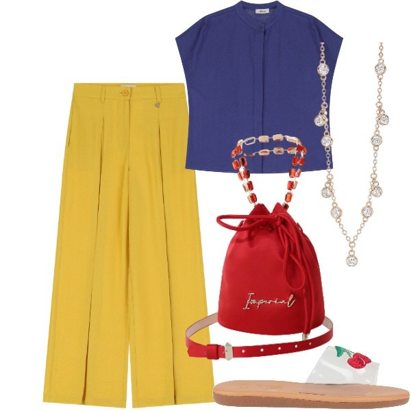 Outfit donna - Ciabattina super trendy. Stile Urban per Tutti i giorni. Abbinamento con sandali in pelle, collane, borse a secchiello, pantaloni a palazzo, camicie a manica corta.
