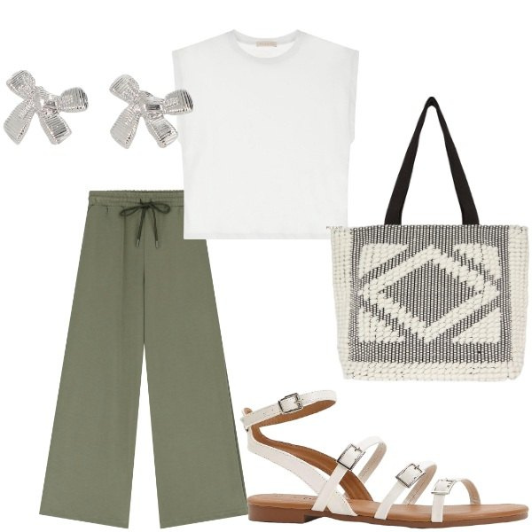 Outfit donna - Outifit di luglio. Stile Casual chic per Tutti i giorni. Abbinamento con sandali, t-shirt, pantaloni a palazzo, orecchini, shopping bag.