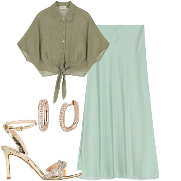 Outfit donna - Una gonna per luglio. Stile Glamour per Serata fuori. Abbinamento con gonne lunghe, camicie a manica corta, orecchini, sandali col tacco.