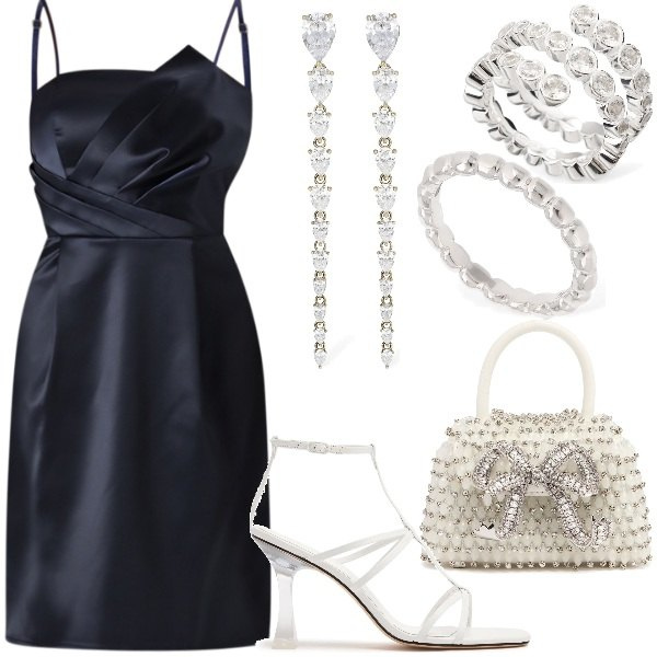 Outfit donna - Risplendi in una serata speciale. Stile Glamour per Serata fuori. Abbinamento con vestiti corti, orecchini, anelli, borse a mano, anelli, sandali in pelle.