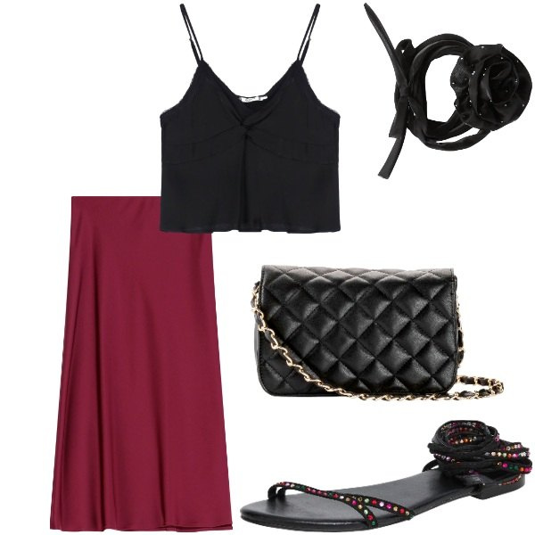 Outfit donna - A cena fuori. Stile Casual chic per Serata fuori. Abbinamento con borse a tracolla, sandali alla schiava, collane, top, gonne longuette.