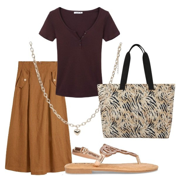 Outfit donna - Serata tra amici. Stile Casual per Tutti i giorni. Abbinamento con gonne, collane, t-shirt, shopping bag, sandali in pelle.