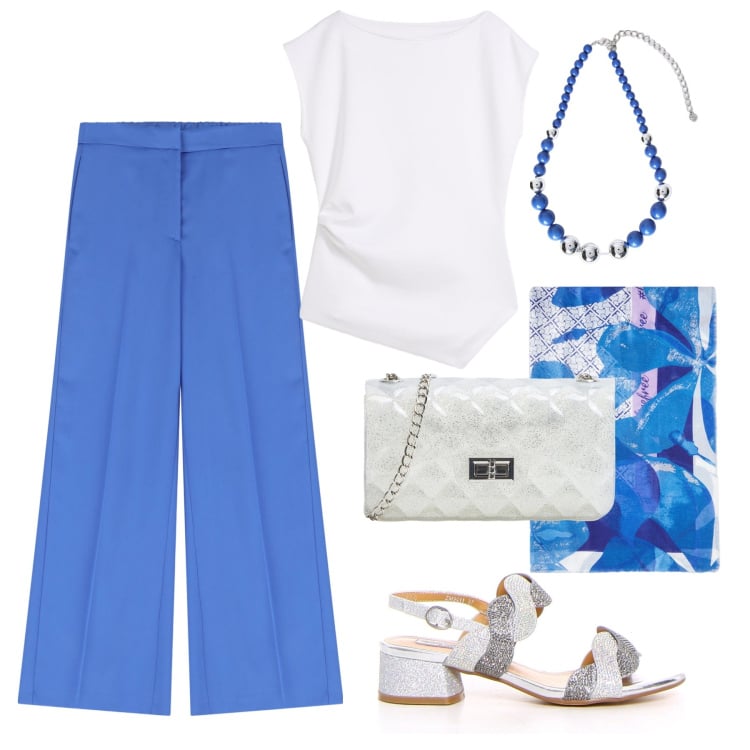 Outfit donna - Il colore del mare a cena. Stile Glamour per Serata fuori. Abbinamento con top, borse a tracolla, pantaloni, stole, collane, sandali col tacco.