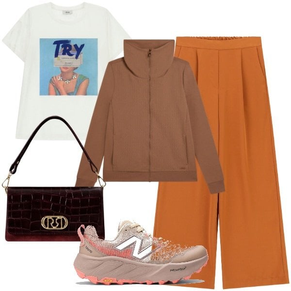 Outfit donna - Una felpa a settembre. Stile Casual chic per Tutti i giorni. Abbinamento con sneakers, borse a mano, felpe, pantaloni a palazzo, t-shirt.