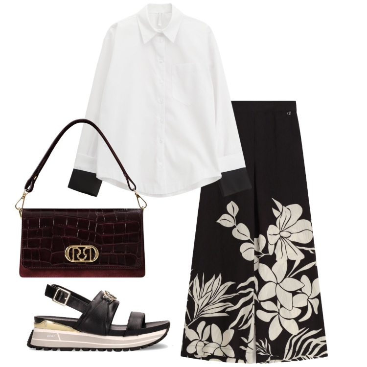 Outfit donna - La camicia bianca coi polsini neri. Stile Bon Ton per Serata fuori. Abbinamento con borse a mano, camicie, pantaloni a palazzo, sandali.
