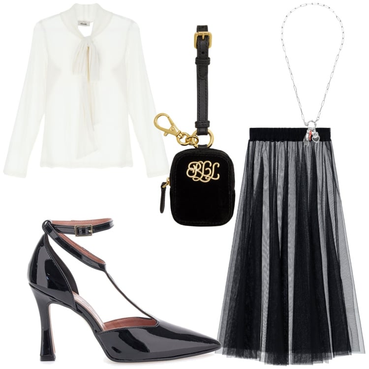 Outfit donna - Romantica in tulle. Stile Romantica per Serata fuori. Abbinamento con ciondoli, gonne lunghe, top, pochette, décolleté.