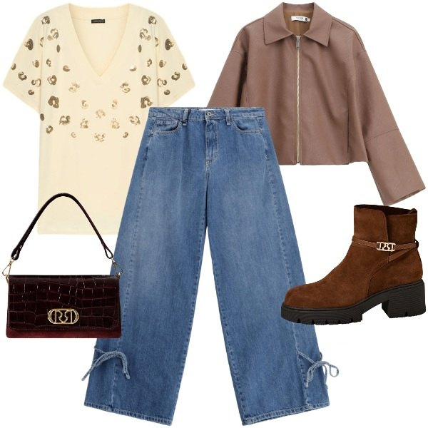 Outfit donna - Street style. Stile Casual chic per Tutti i giorni. Abbinamento con jeans, blazer, stivaletti, borse a mano, t-shirt.