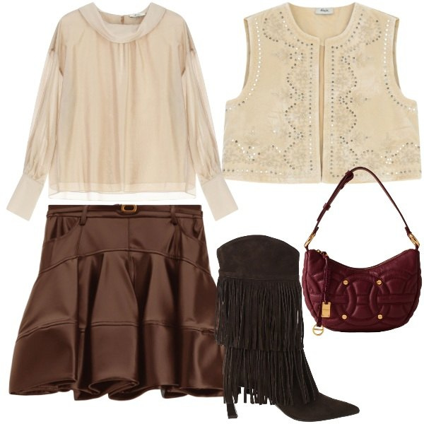 Outfit donna - Pellami morbidi. Stile Chic per Serata fuori. Abbinamento con minigonne, camicie, stivali, gilet, borse a spalla.