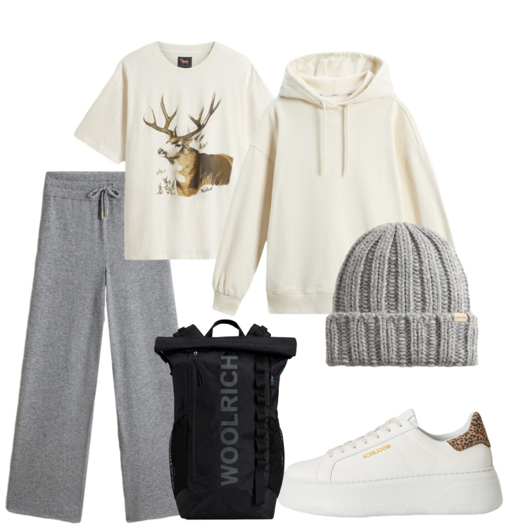 Outfit donna - Sportiva in Woolrich. Stile Sporty chic per Tutti i giorni. Abbinamento con berretti, sneakers, pantaloni, t-shirt, felpe con cappuccio, zaini.