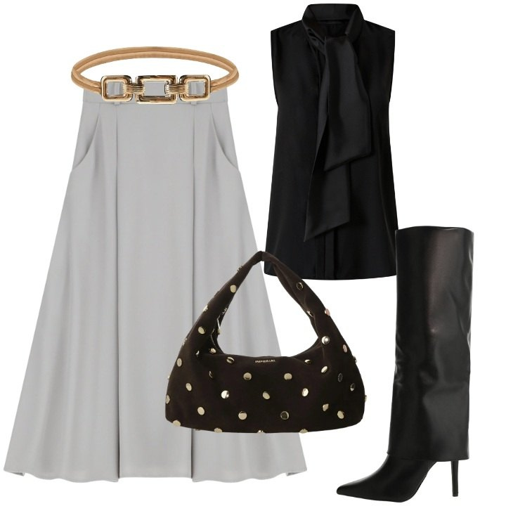 Outfit donna - Il potere del punto vita - FDCI. Stile Trendy per Serata fuori. Abbinamento con top, cinture, gonne lunghe, stivali, borse a spalla.