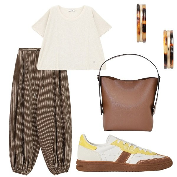 Outfit donna - A spasso per la città. Stile Casual per Tutti i giorni. Abbinamento con borse a mano, pantaloni a palazzo, top, sneakers, orecchini.