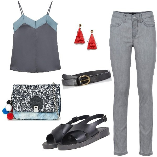 Outfit donna - Laura cabrera pisano 3-3-5\'19. Abbinamento con jeans skinny, borsa a tracolla blu, sandali collo aperto con fasce, canottiera contrasto con spalline sottili in raso, cintura nero, orecchini.