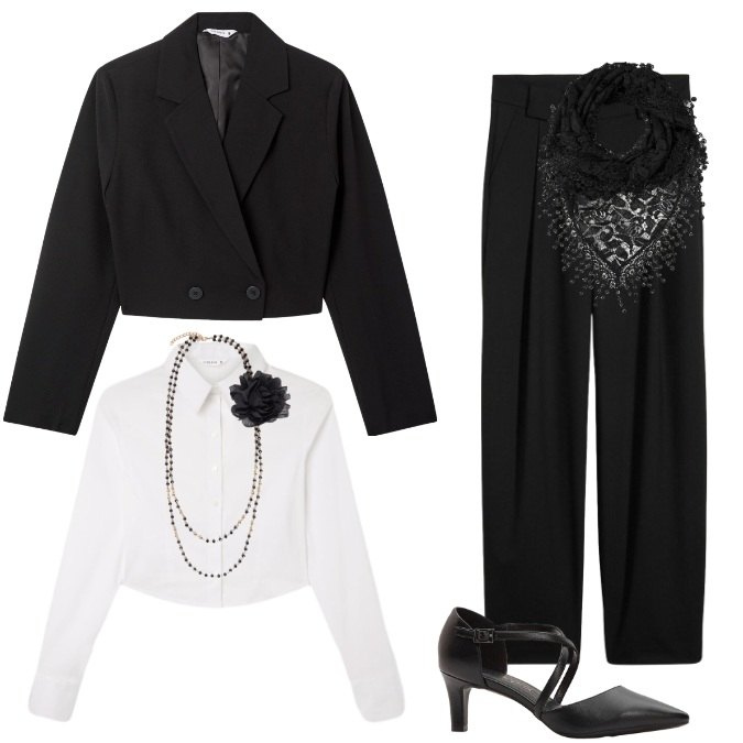 Outfit donna - Il Pareo in pizzo nero super trendy. Stile Glamour per Serata fuori. Abbinamento con pantaloni, décolleté, blazer, camicie, canottiere, collane.