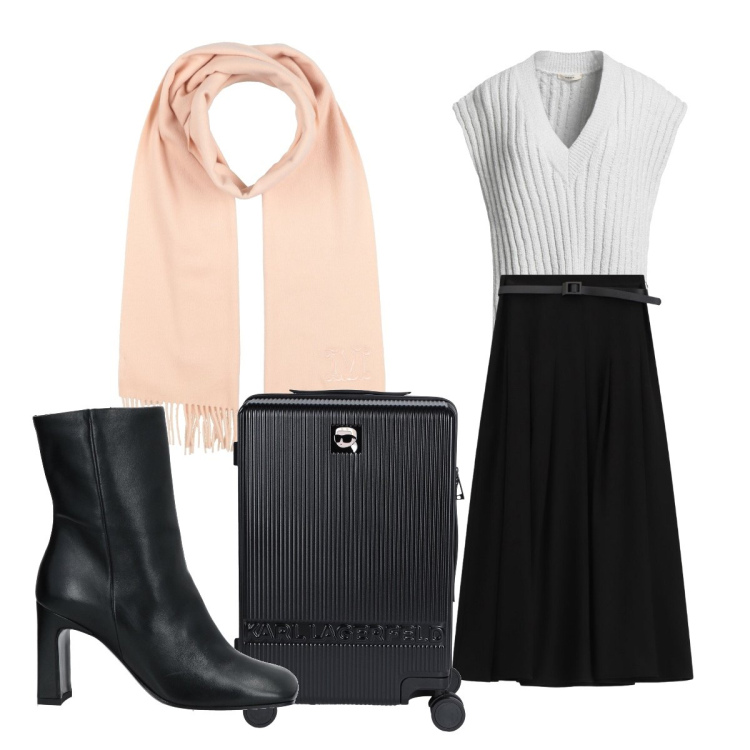 Outfit donna - Impeccabile anche in viaggio. Stile Casual chic per Tutti i giorni. Abbinamento con stivaletti, valigie, sciarpe, pullovers, gonne lunghe.