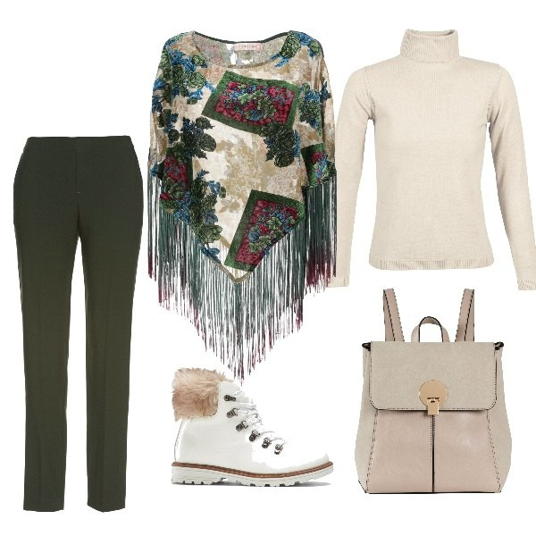Outfit donna - Tutti insieme nello chalet. Stile Etnico per Tutti i giorni. Abbinamento con mantella senza tasche fantasia floreale con frange collo tondo interno sfoderato in velluto crêpe, stivaletti, zaino effetto scamosciato a scatto interno foderato in pelle sintetica con scomparti marrone, pantalone verde, maglione.