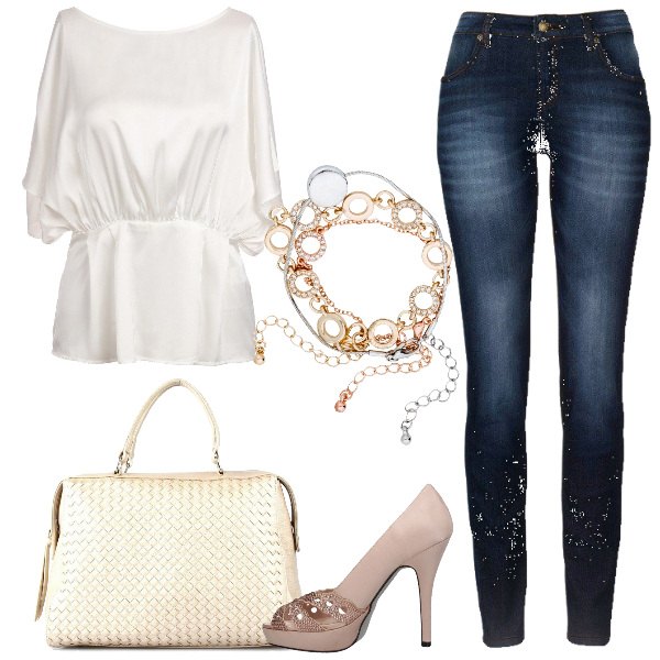 Outfit donna - Aperitivo con gli amici. Stile Trendy per Serata fuori. Abbinamento con jeans skinny, blusa in raso.