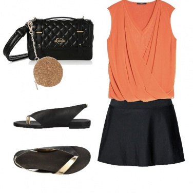 Outfit Gonna nera e top arancio