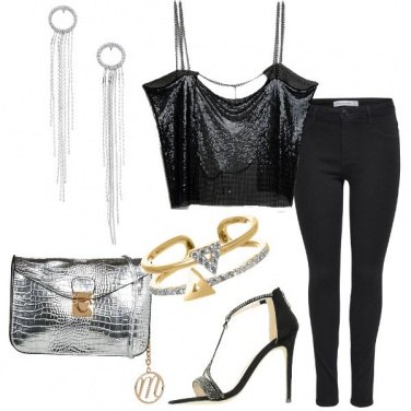 Outfit Top in maglia metallica e jeans slim fit