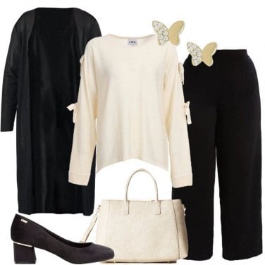 Outfit Il pullover crema con i fiocchi