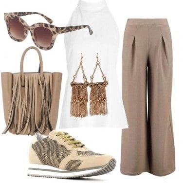 Outfit In sneakers come una fashion blogger