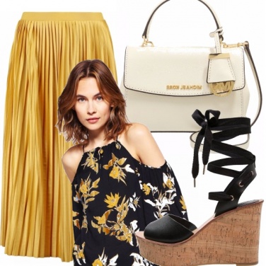 Outfit Gonna plissè: un must dell\'estate