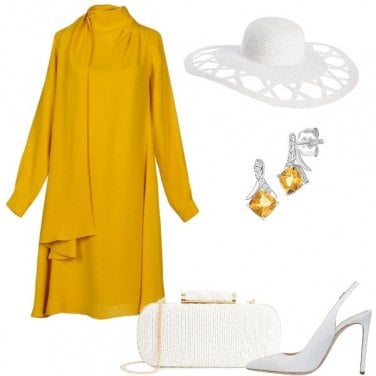 Outfit In giallo come Amal Clooney