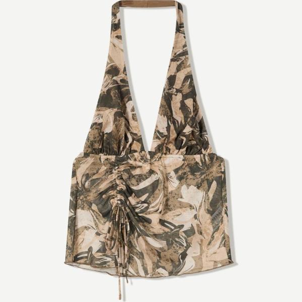 top Bershka blanco con diseños